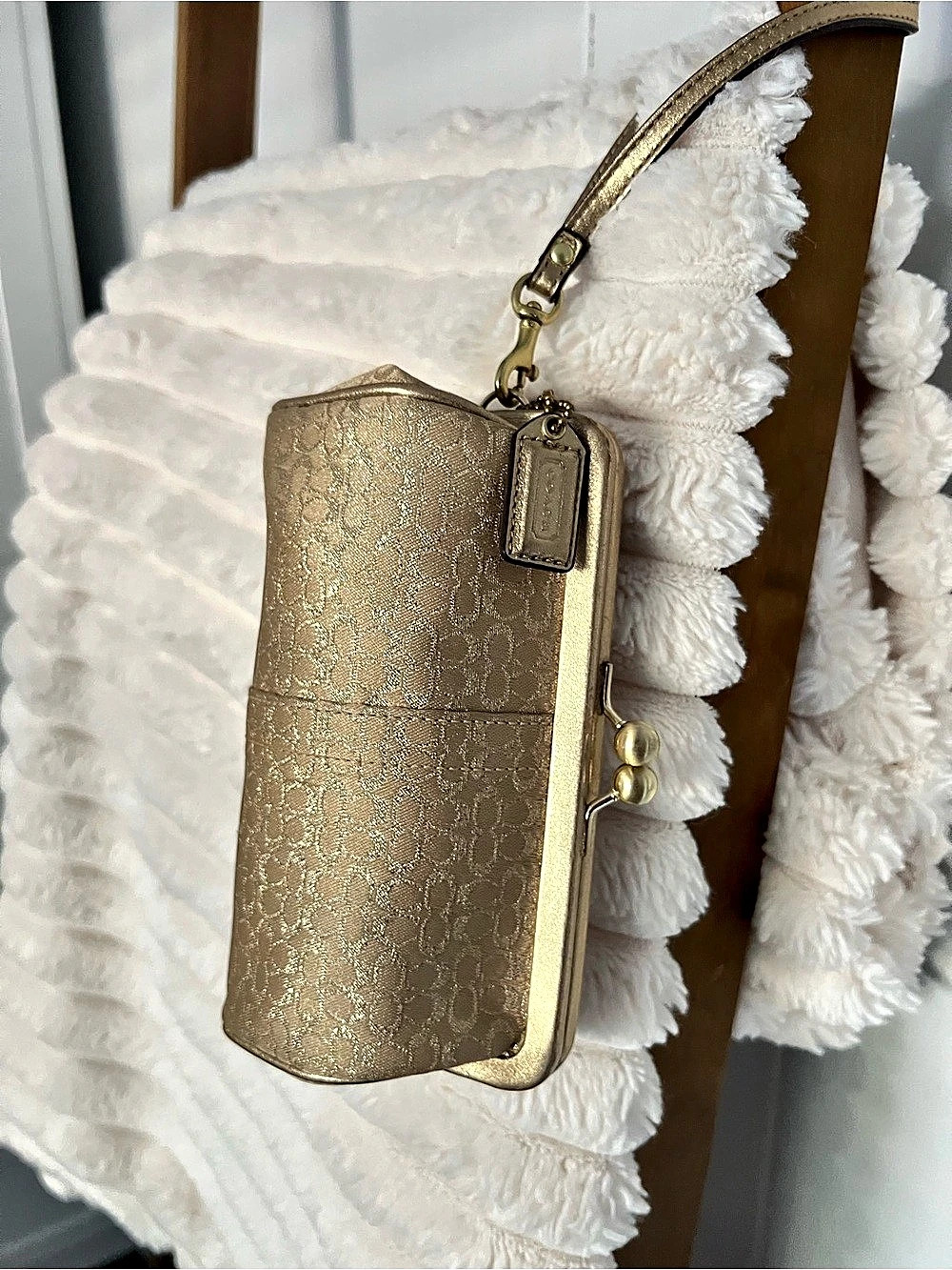 Coach Wristlet Clutch in Gold